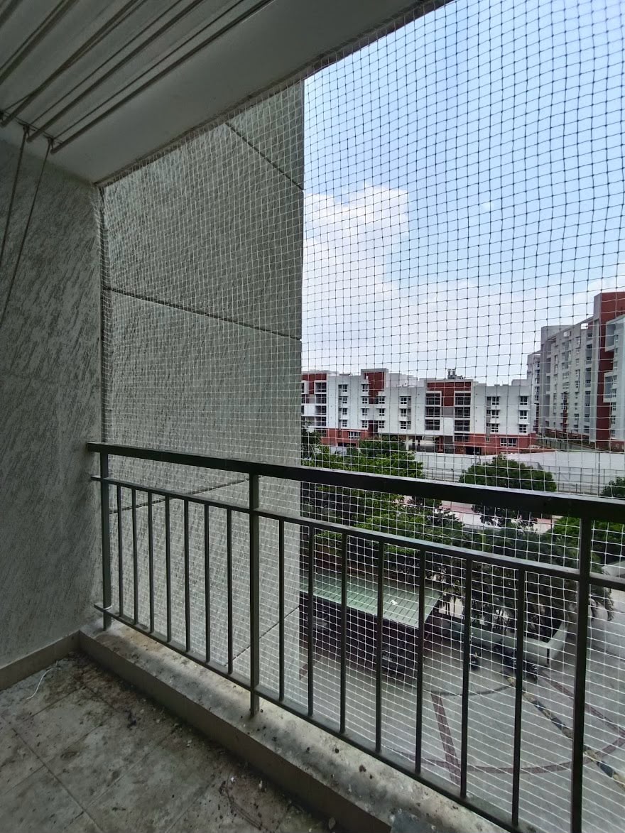 Completed balcony bird safety net installation