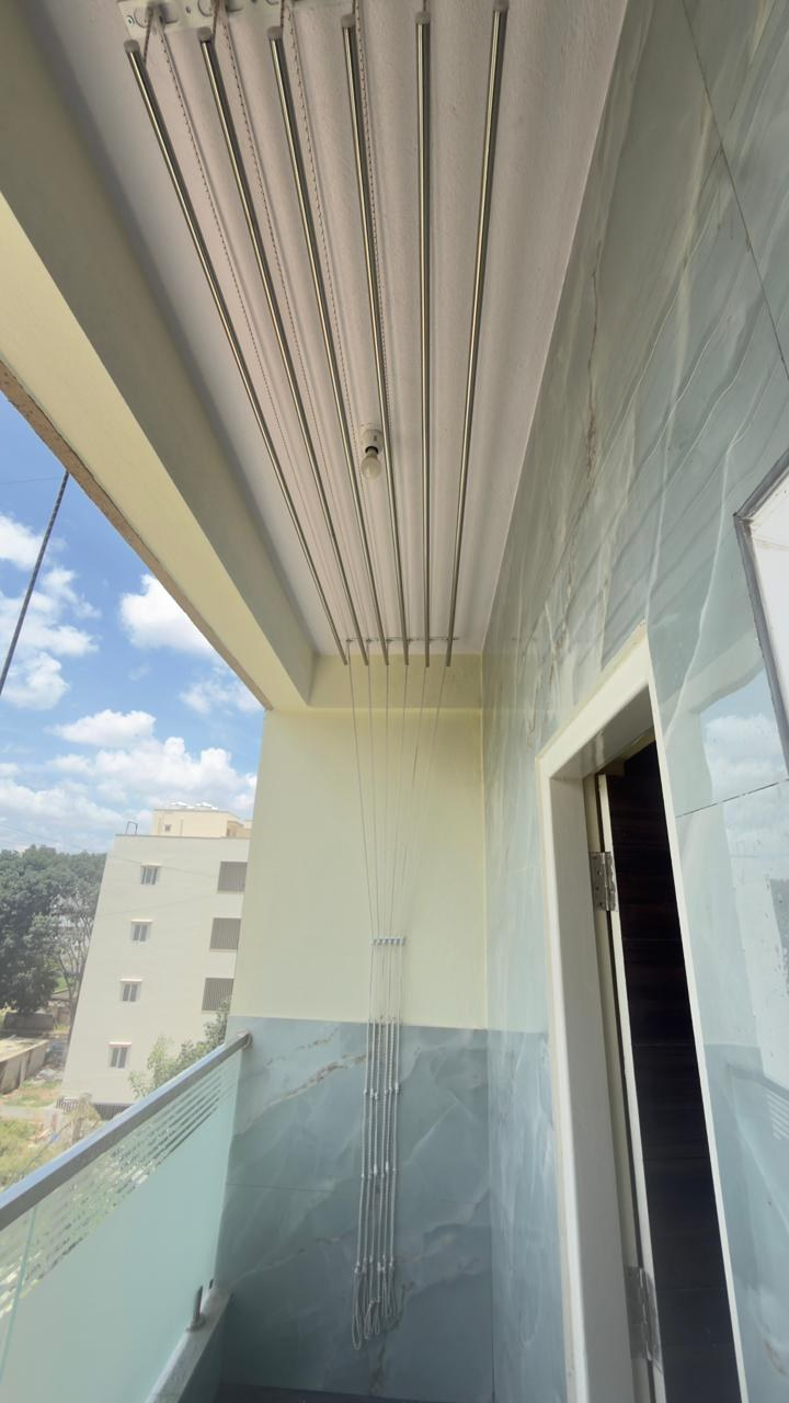 Ceiling and wall-mounted cloth hanger options