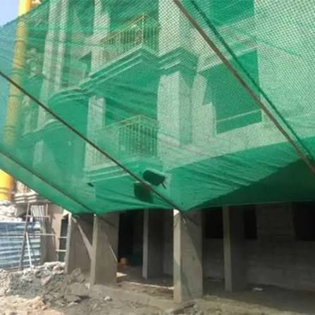 Green construction safety net over building work area